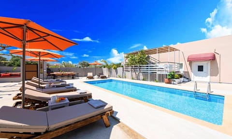 Patio, Day, Natural landscape, Pool view, Swimming pool, sunbed