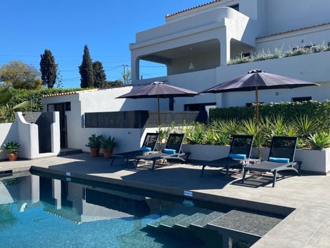 Property building, Patio, Day, Garden, Garden view, Pool view, Swimming pool, sunbed