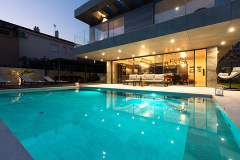 Property building, Night, Swimming pool