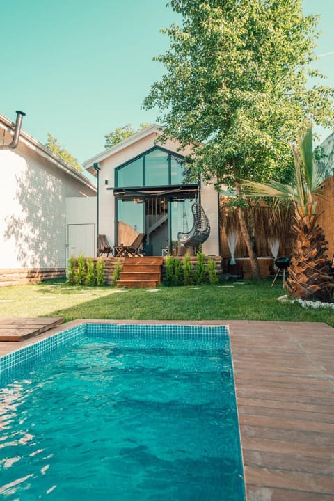 Property building, Patio, Garden, Pool view, Swimming pool