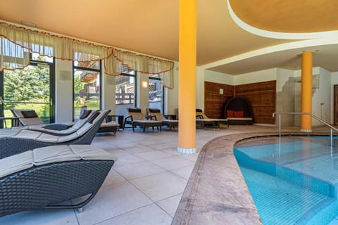 Property building, Living room, Swimming pool