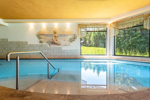 Property building, Living room, Swimming pool