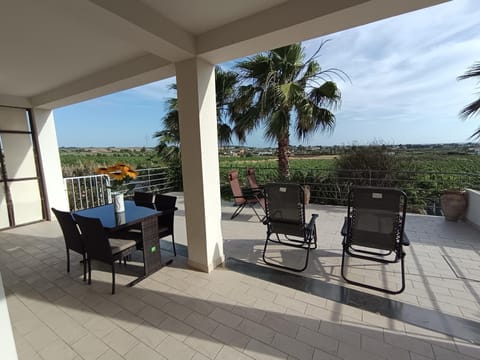 Property building, Patio, Natural landscape, View (from property/room), Balcony/Terrace, Dining area