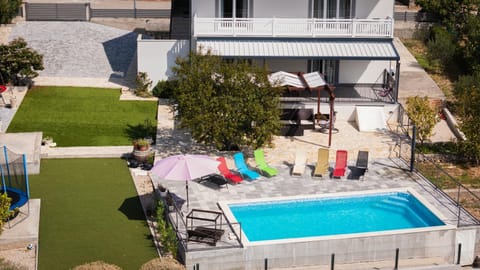 Property building, Patio, Pool view, Swimming pool
