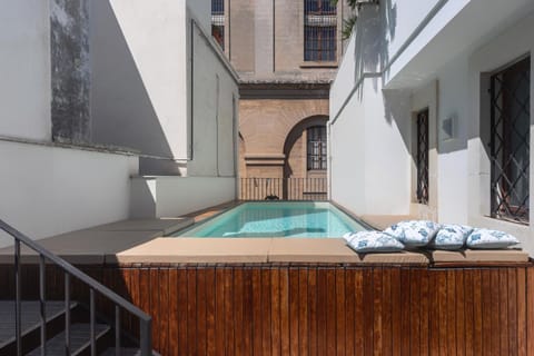 Property building, Living room, Swimming pool