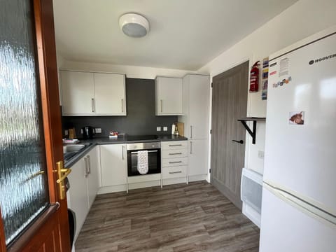 Kitchen or kitchenette, oven, stove