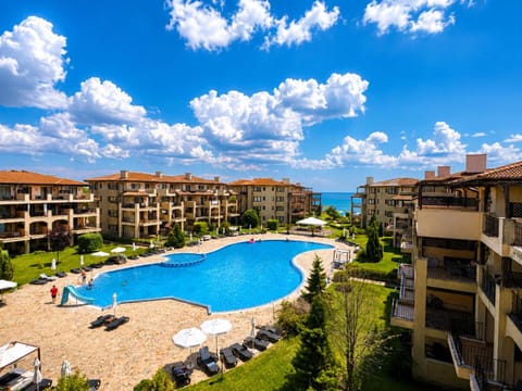 Property building, Day, Pool view, Sea view, Swimming pool, sunbed