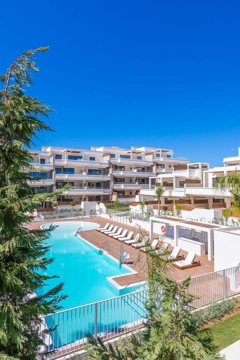 Property building, Pool view, Swimming pool, sunbed