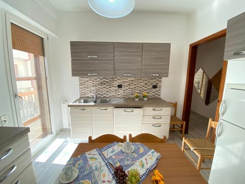 Dining area, stove, kitchen