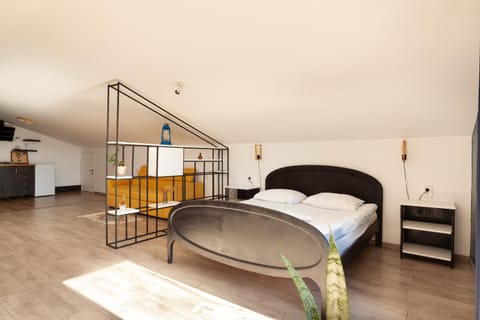 Bed, Seating area, Bedroom, City view, Garden view