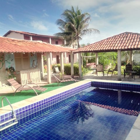 Property building, Day, Pool view, Swimming pool, sunbed