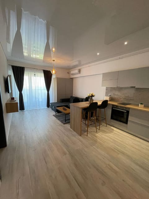 Kitchen or kitchenette, Living room, Seating area, Dining area