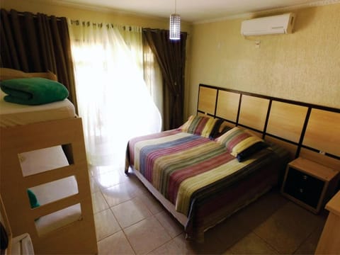 Bed, Photo of the whole room, Bedroom, bunk bed, air conditioner