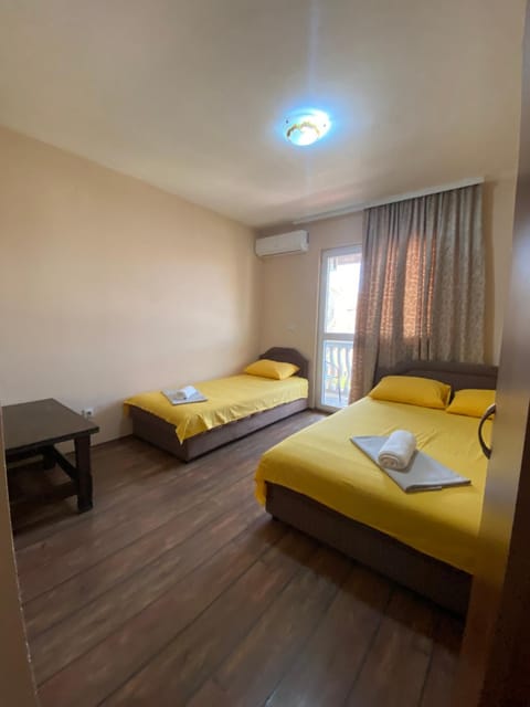 Bed, Photo of the whole room, towels, air conditioner