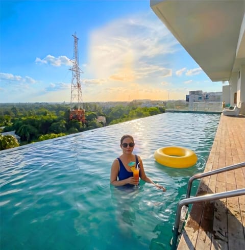 Property building, Day, People, Natural landscape, Pool view, Swimming pool