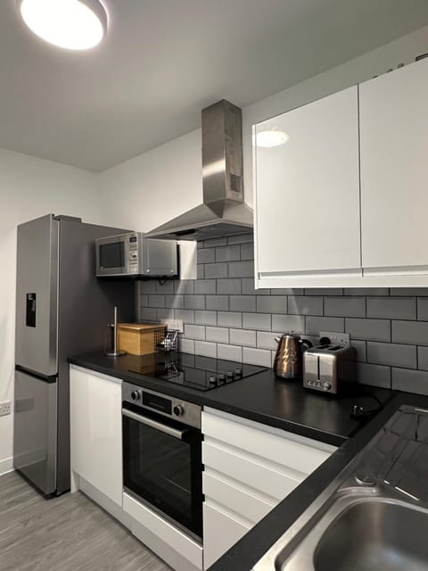 Kitchen or kitchenette, oven, stove, toaster, kitchen