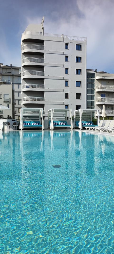 Property building, Pool view, Swimming pool, sunbed