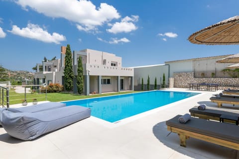 Property building, Day, Natural landscape, Pool view, Swimming pool, sunbed