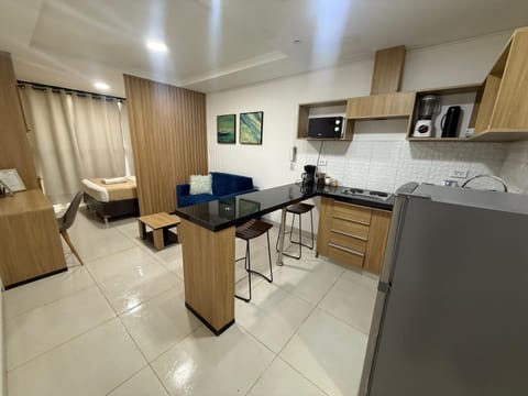Kitchen or kitchenette, Living room, Seating area, Dining area