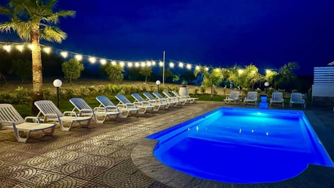 Property building, Living room, Swimming pool