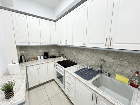 Kitchen or kitchenette, stove