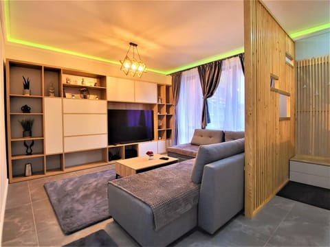 Bed, TV and multimedia, Living room, Seating area
