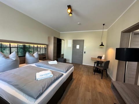 Bed, TV and multimedia, Living room, Seating area, Bedroom, wardrobe