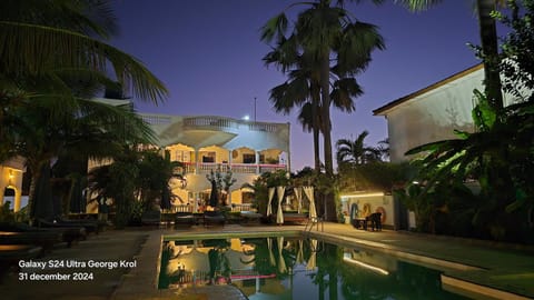 Property building, Night, Swimming pool