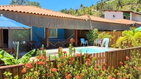 Property building, Patio, Day, Natural landscape, Garden, Garden view, Pool view, Swimming pool, sunbed