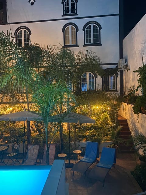 Property building, Patio, Night, Garden, Garden view, Pool view, Swimming pool, sunbed