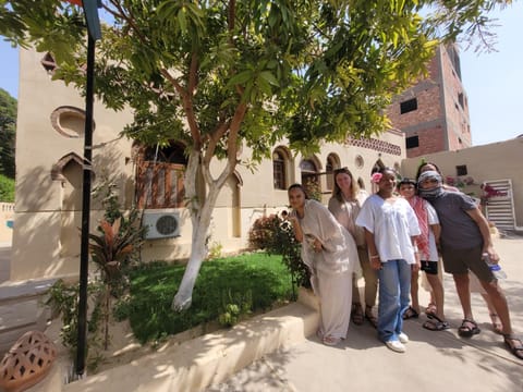 Property building, Day, group of guests, Family