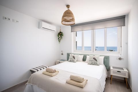 Bed, Decorative detail, Bedroom, Sea view