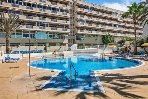 Property building, Living room, Swimming pool