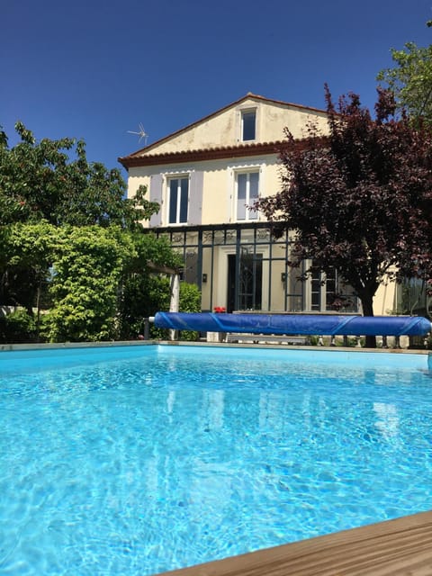 Property building, Pool view, Swimming pool, sunbed