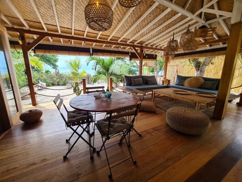 Property building, Day, View (from property/room), Balcony/Terrace, Living room, Seating area, Dining area, Beach, Dinner, Dinner