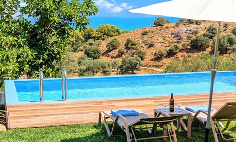 Day, Natural landscape, Beach, Mountain view, Pool view, Sea view, Swimming pool, sunbed