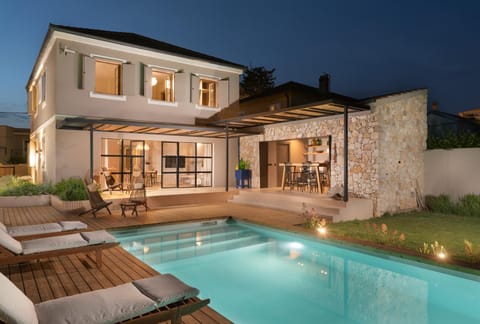 Property building, Night, Pool view, Swimming pool, sunbed