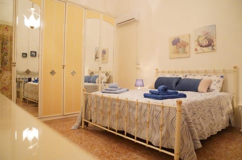 Bed, Bedroom, towels, wardrobe, air conditioner