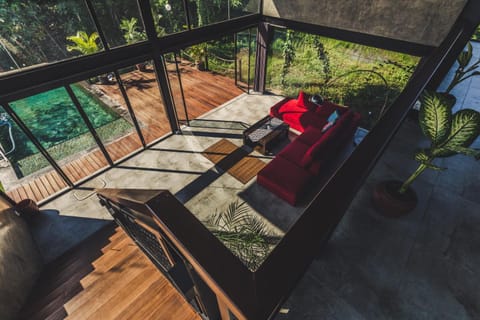 Living room, Seating area, Pool view