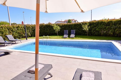 Patio, Day, Pool view, Swimming pool, sunbed
