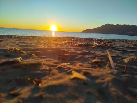 Nearby landmark, Natural landscape, Beach, Sunrise