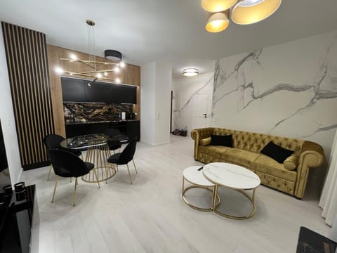 Kitchen or kitchenette, Living room, Seating area, Dining area
