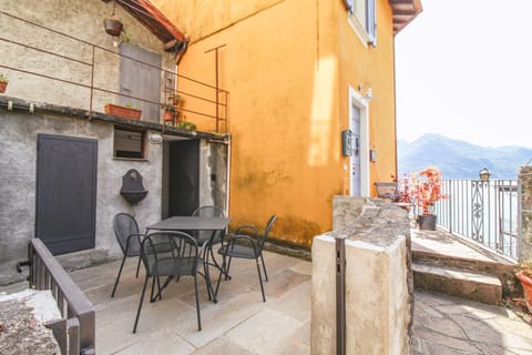 Property building, Patio, Day, Natural landscape, View (from property/room), Dining area, Lake view, Mountain view