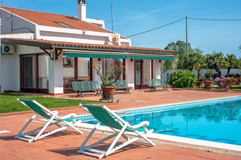 Property building, Living room, Swimming pool