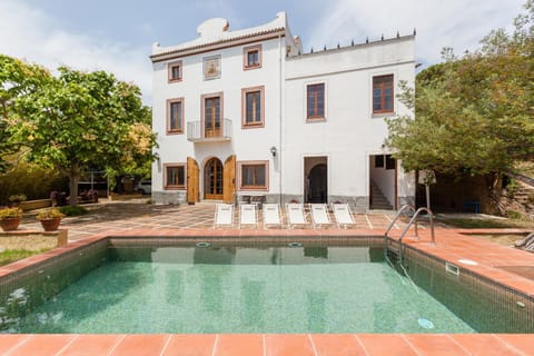 Property building, Living room, Swimming pool
