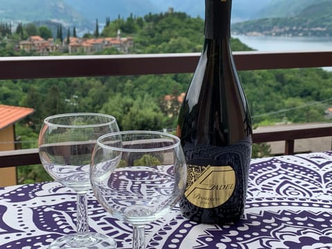 View (from property/room), Balcony/Terrace, Lake view, Mountain view, Drinks