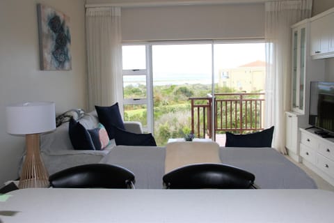 Living room, Seating area, Garden view, Sea view