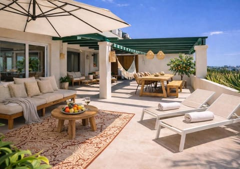 Property building, View (from property/room), Balcony/Terrace, Balcony/Terrace, Seating area, sunbed