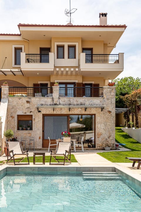 Property building, Patio, Swimming pool