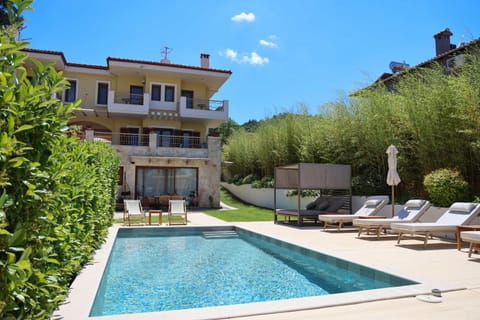 Property building, Patio, Garden, Swimming pool